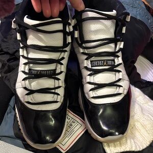 Jordan 11 takeover Black and White Sneakers